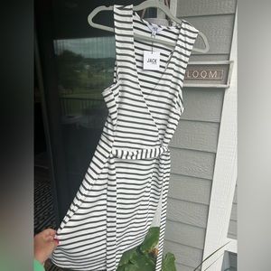 Black/white stripe dress just above the knee—ties in the back size large.